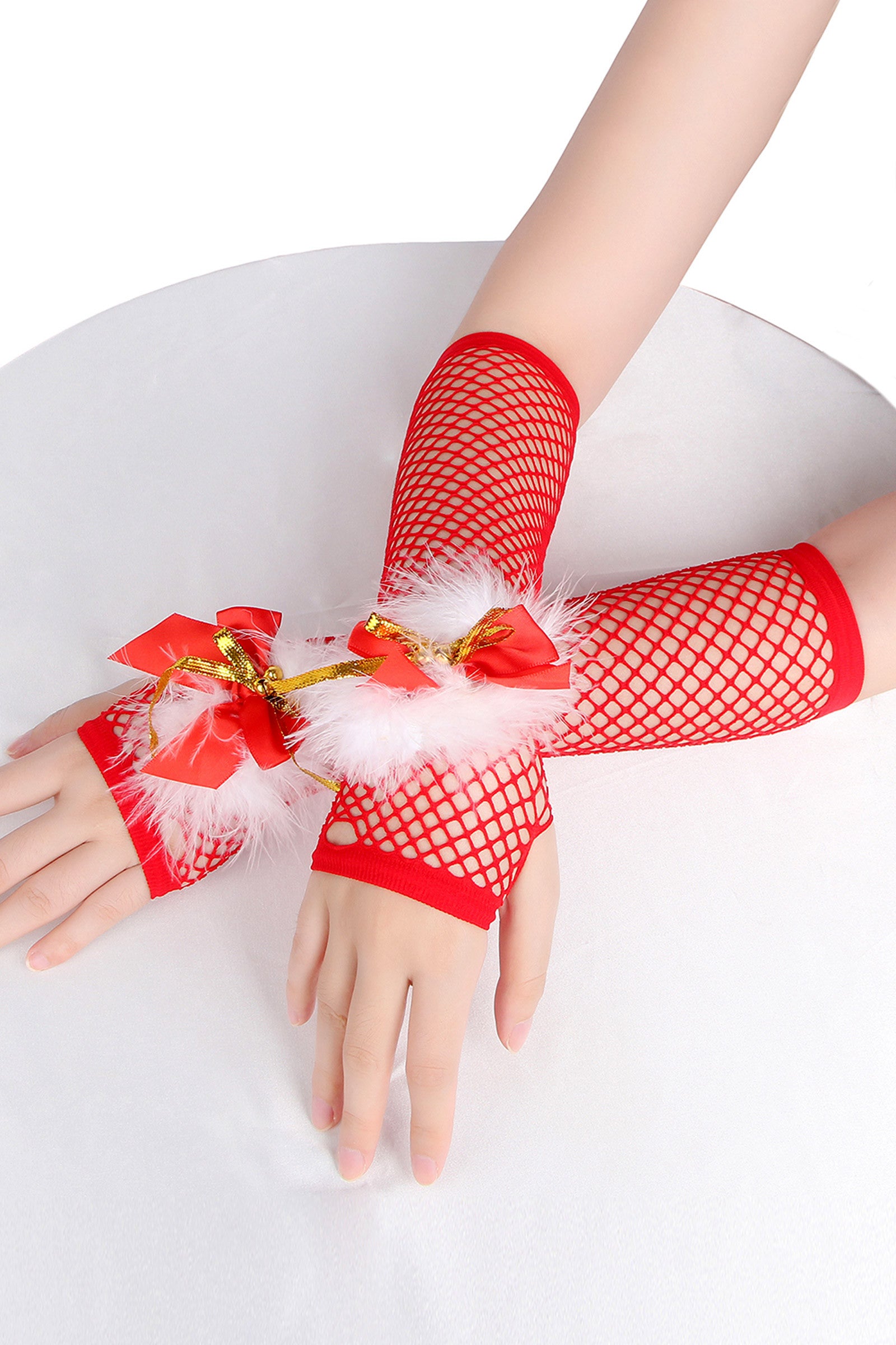 Mitaines rouges à clochettes de Noël